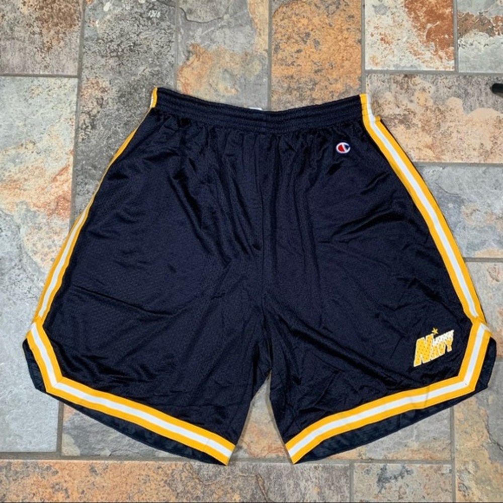 Champion navy blue “Navy Lacrosse” athletic shorts.